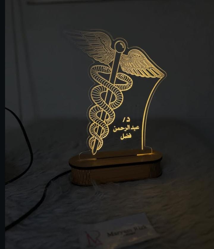 Illuminated medical caduceus plaque